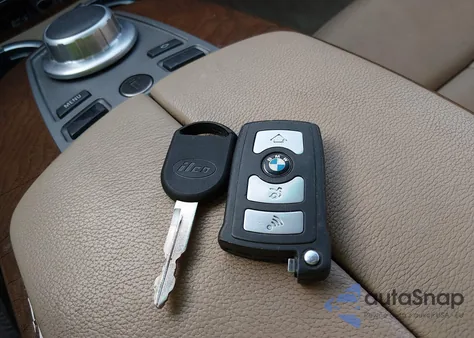 2006 BMW 750Li из США, поврежденный, VIN WBAHN83576DT59984